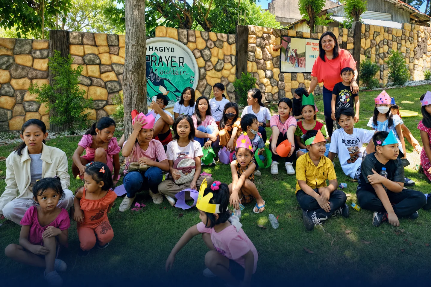 Children wearing colorful craft crowns with their CSB Vizcaya Kids Ministry leader