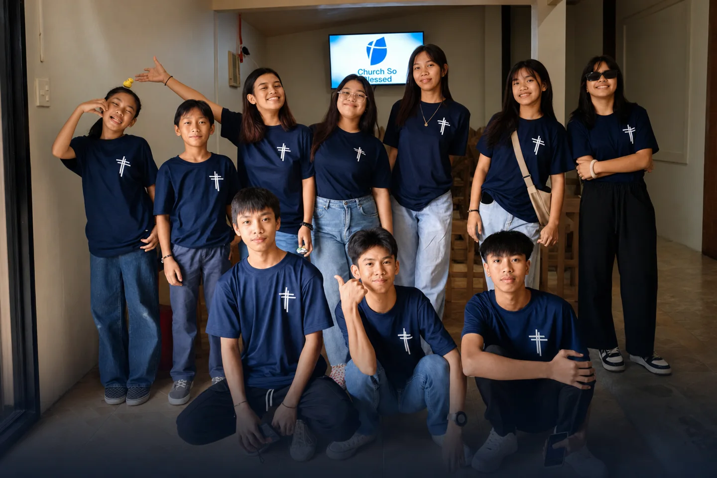 CSB Vizcaya welcome team smiling at the church entrance